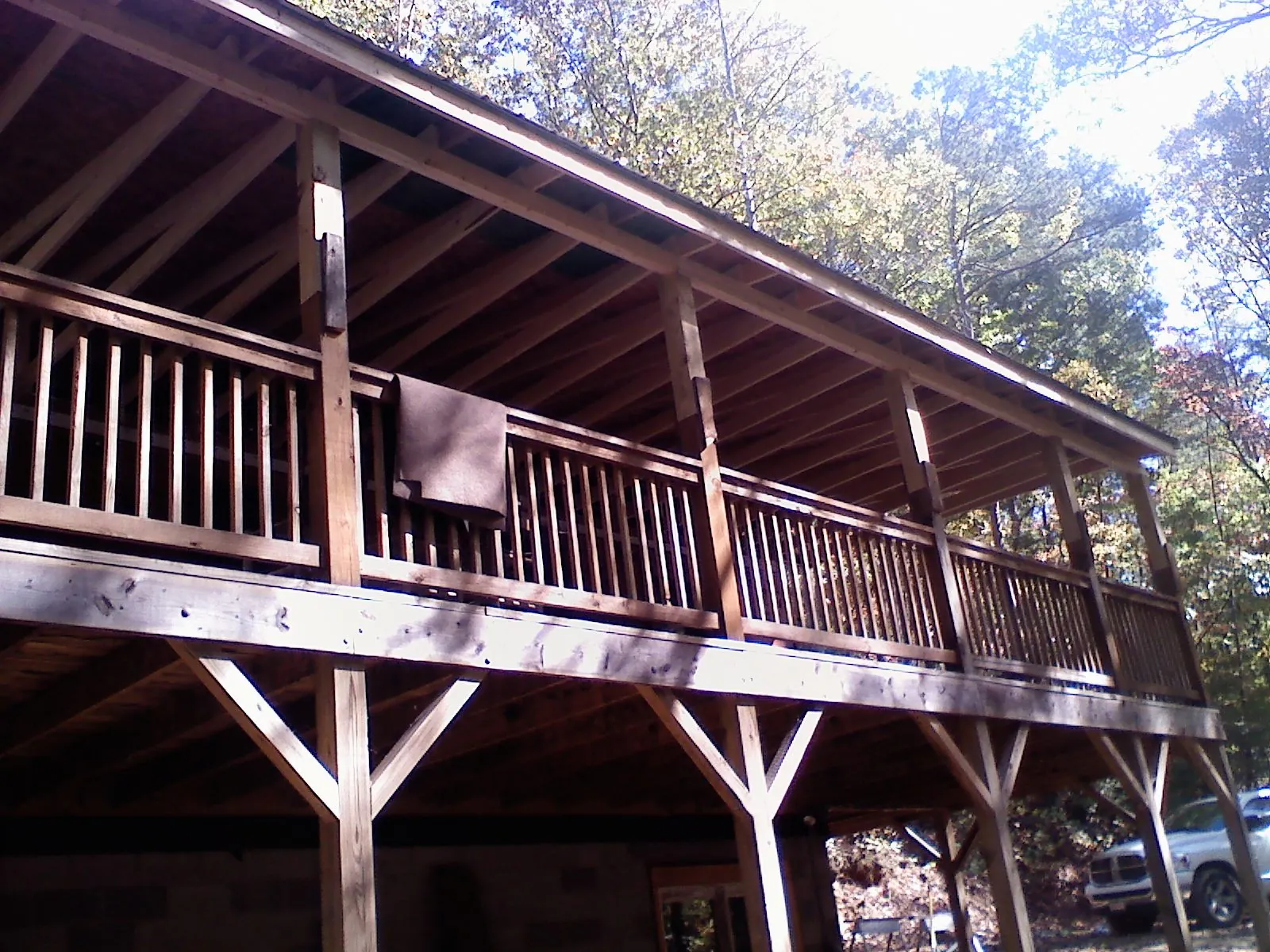 Timber framing under a new elevated porch and deck — Roof Leak Repair in Manley by Roofing Brothers